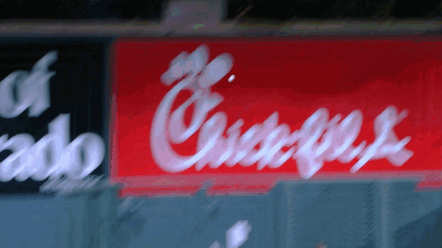 An animated gif of Colton Cowser robbing a home run and falling to the ground