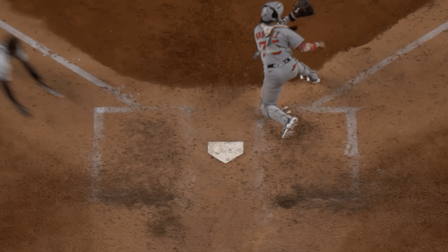 An animated gif of Jazz Chisholm Jr. sliding home