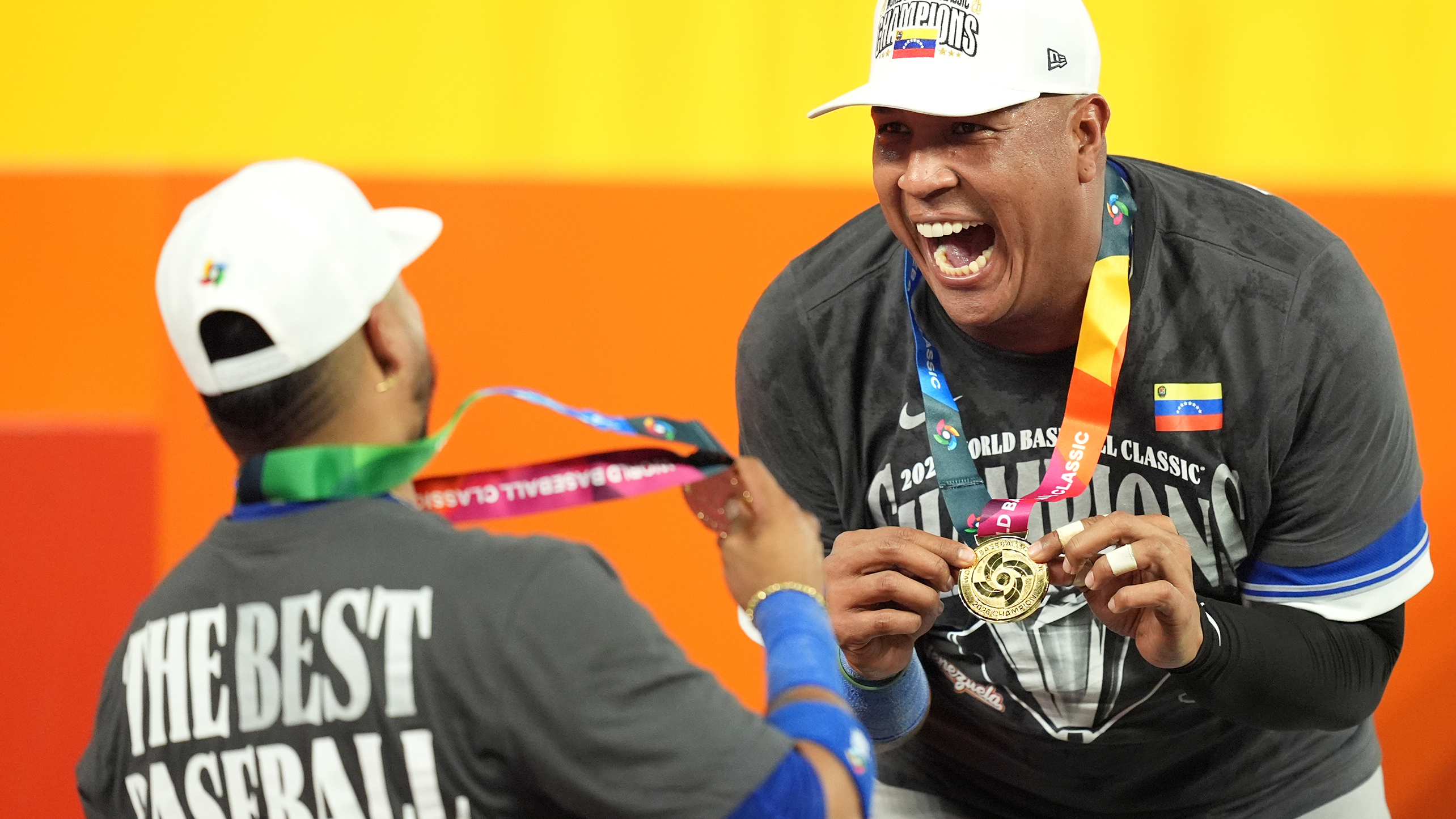 Salvador Perez celebrates after receiving his medal
