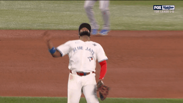 An animated gif of Vladimir Guerrero Jr. making an over-the-shoulder catch