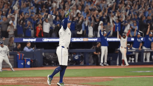 An animated gif of George Springer leaping down the first-base line