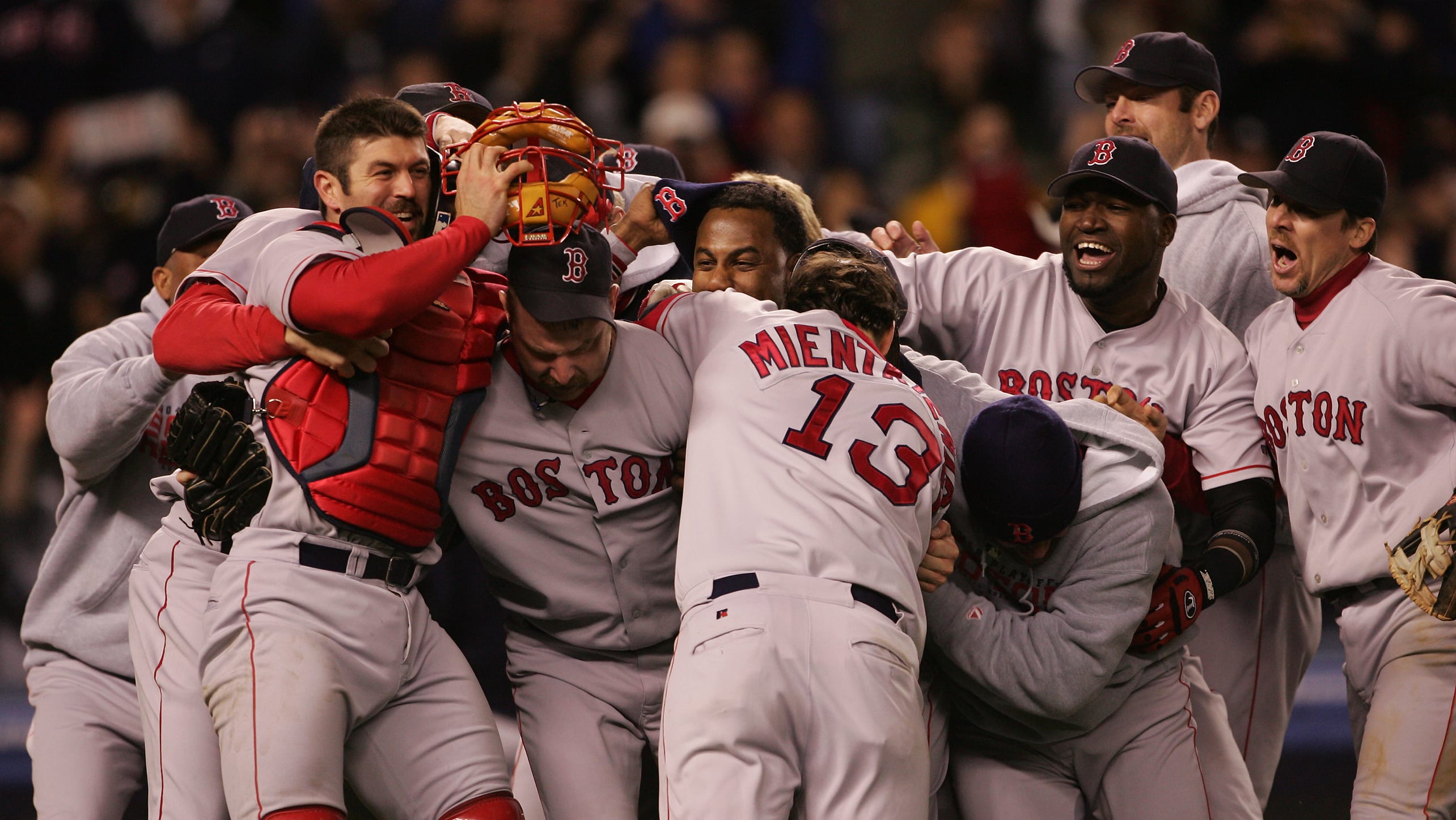 The Red Sox celebrate after winning the 2004 ALCS.