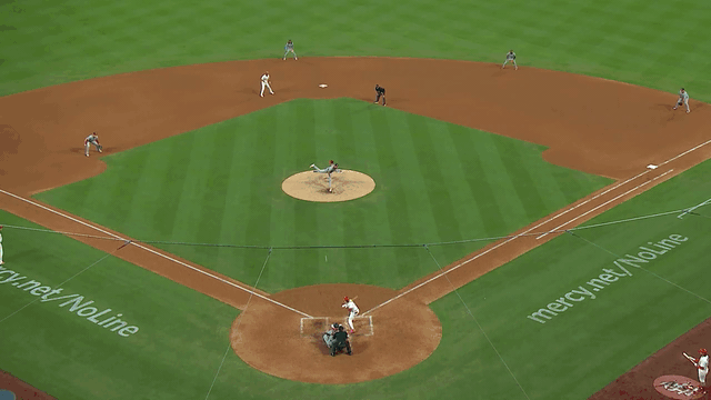 An animated gif of Alex Call making a diving catch in right field