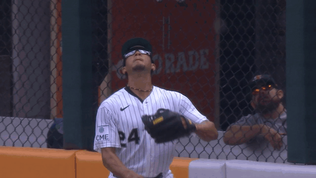 An animated gif of Braden Montgomery making a leaping catch at the wall