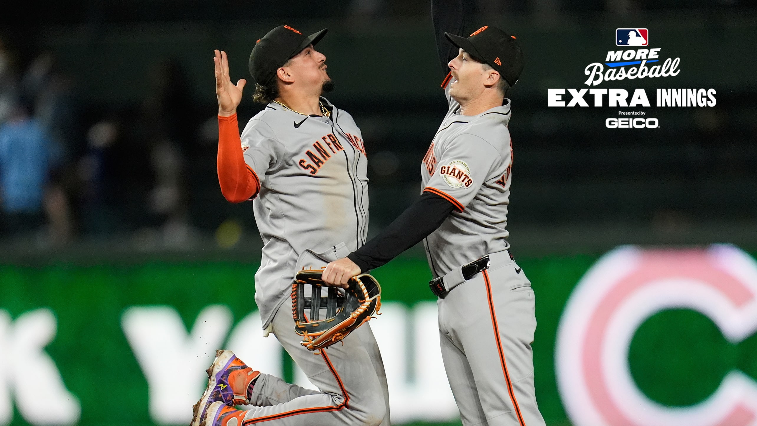 Willy Adames and Mike Yastrzemski celebrate the Giants' victory