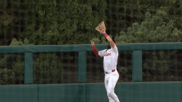 An animated gif of Brandon Marsh robbing a home run