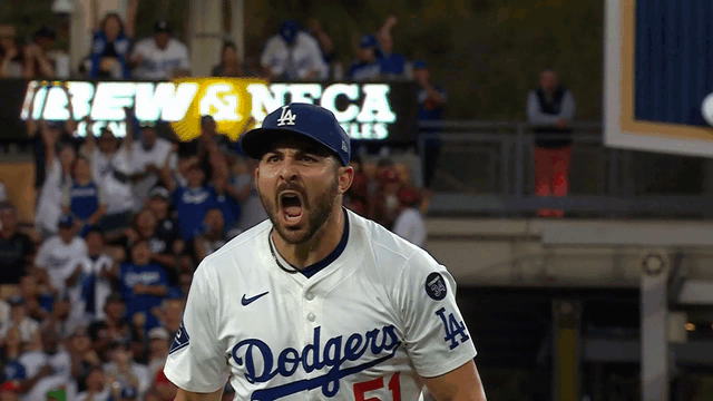 An animated gif of Alex Vesia celebrating a big strikeout