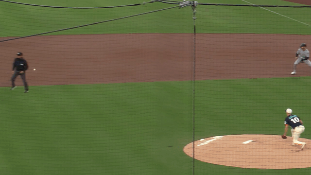 An animated gif of the Padres turning a double play after the second baseman deflects the ball to the shortstop, who throws on to first base