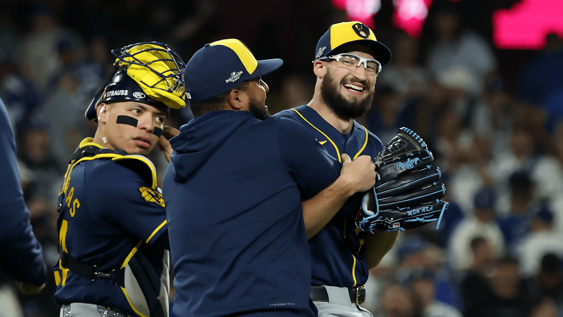 Aaron Ashby is hugged after the final out