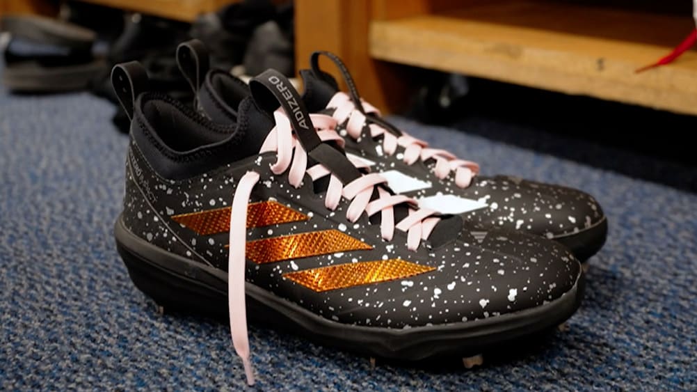 Brandon Pfaadt's cleats sporting pink shoelaces