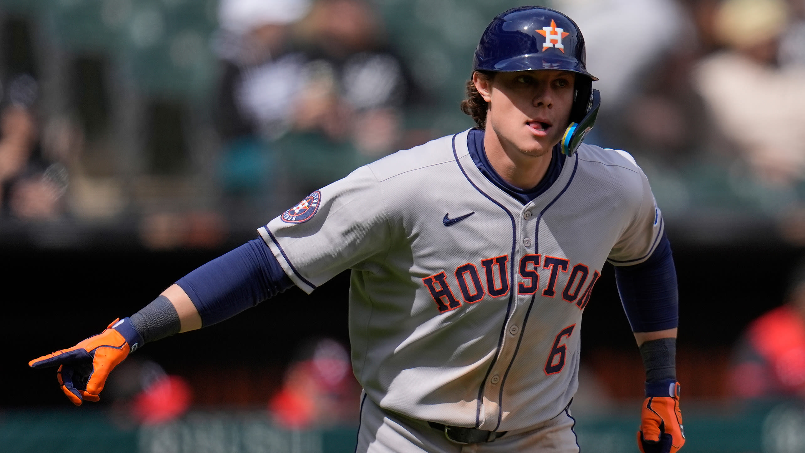 Jake Meyers points as he rounds the bases