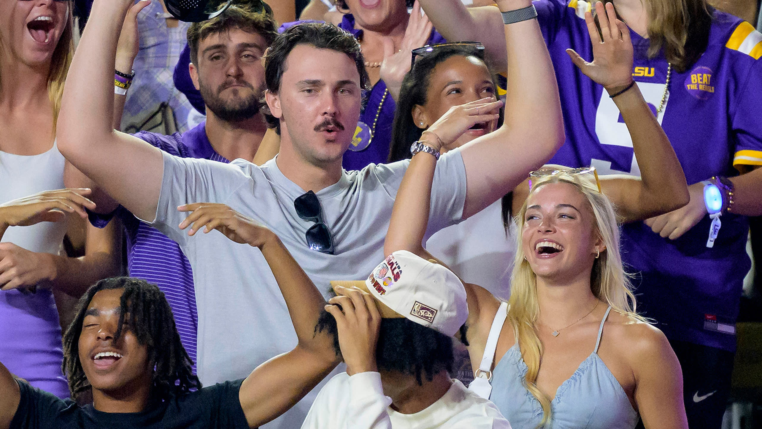 Paul Skenes and Livvy Dunne at an LSU football game