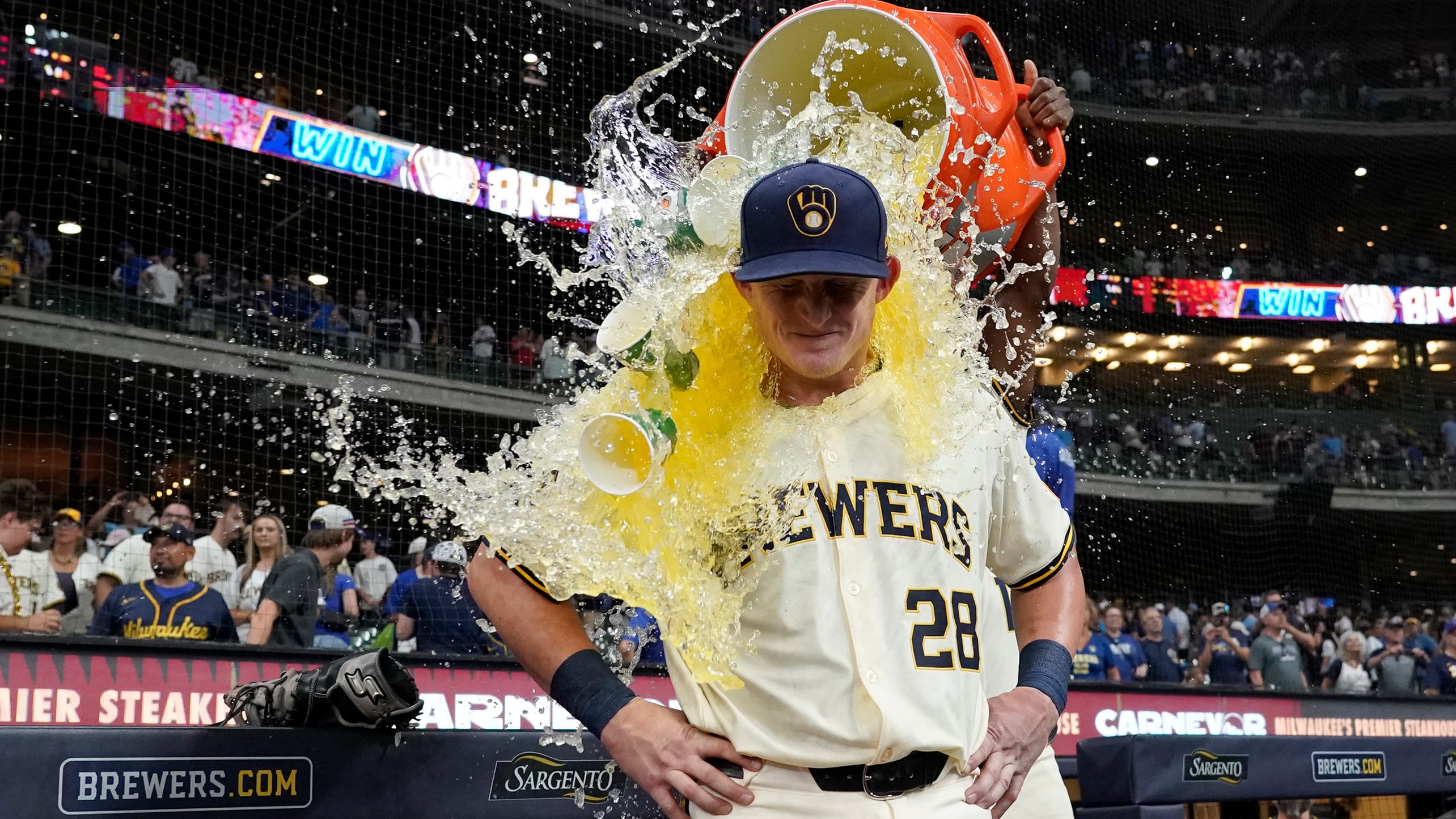 The Brewers' Andrew Vaughn is doused in Gatorade