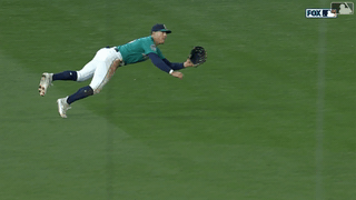 An animated gif of Dylan Moore making a diving catch