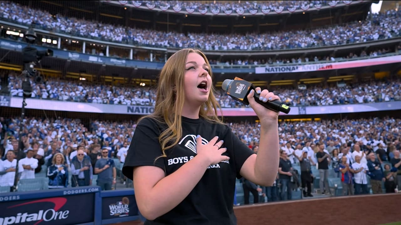 19-year-old Pearle Peterson sings the national anthem before Game 2 of the World Series