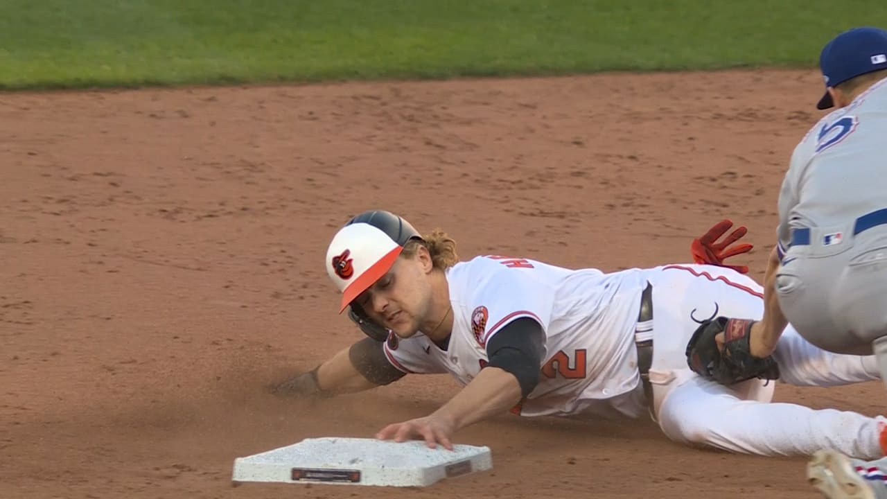 Gunnar Henderson reaches out for second base after being tagged on a stolen-base attempt
