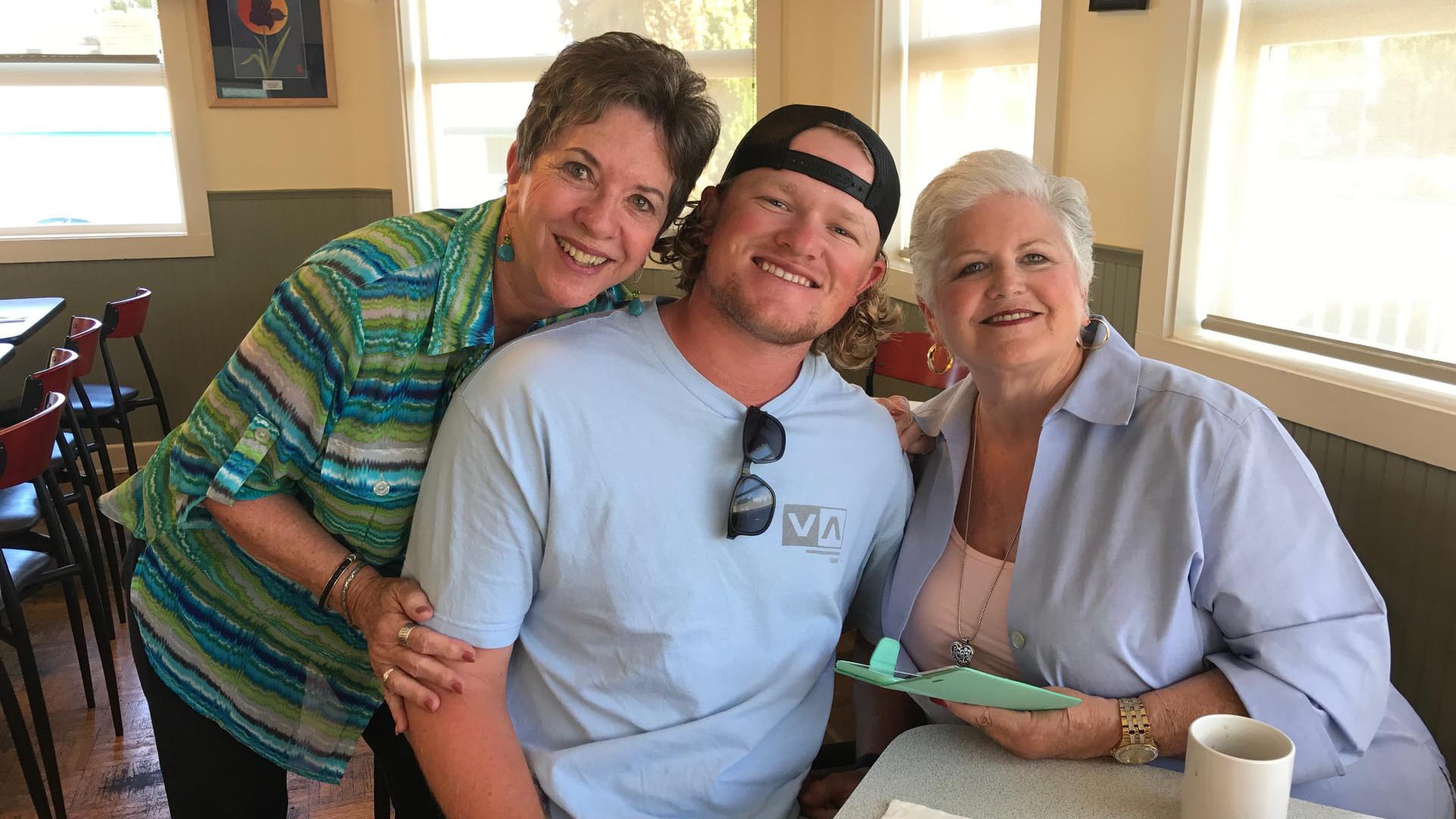Logan Webb with his grandmothers Patty Fecanin and Jan Webb