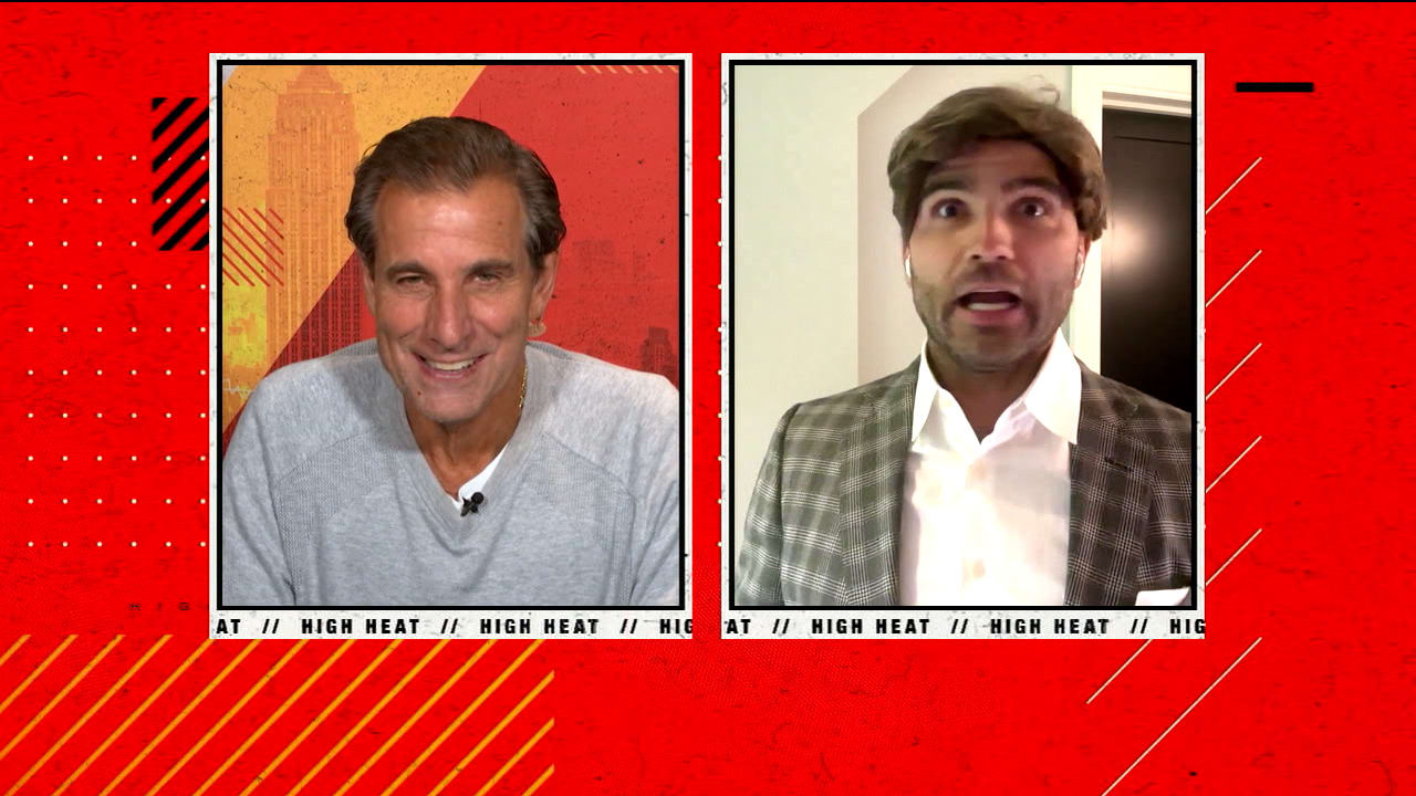 A screengrab of TV host Chris ''Mad Dog'' Russo and Joey Votto in a wig, impersonating Russo