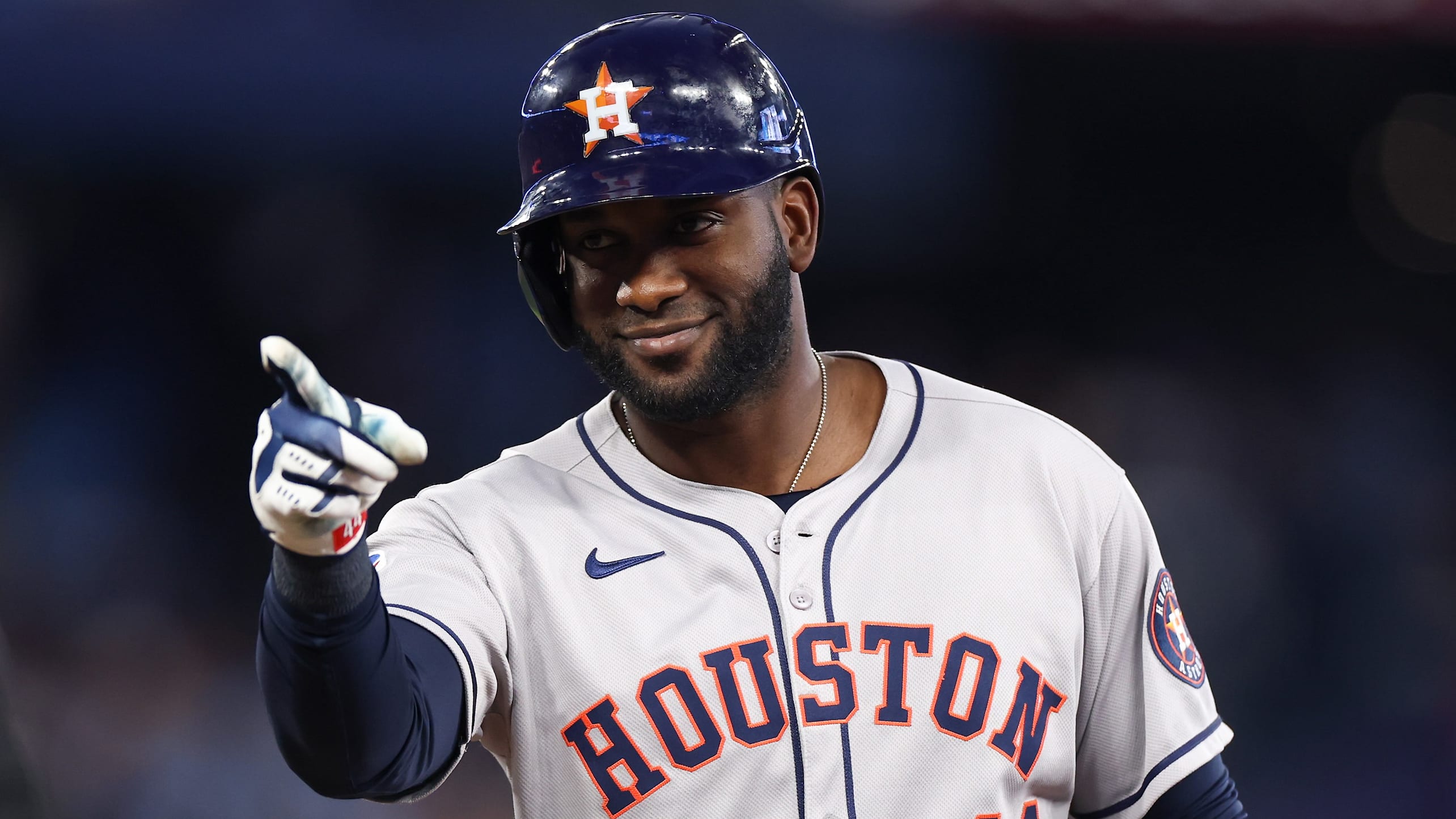 Yordan Alvarez points and smiles
