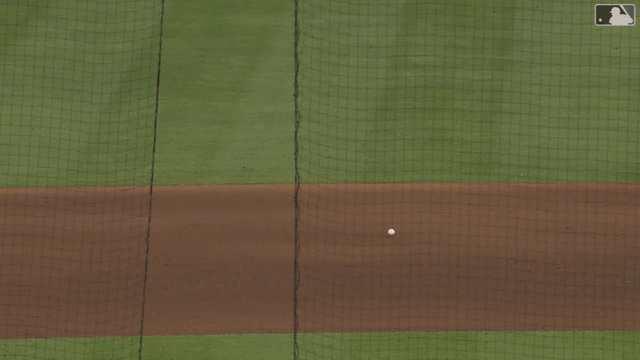 An animated gif of Carlos Correa making a diving stop and throw to first for the out