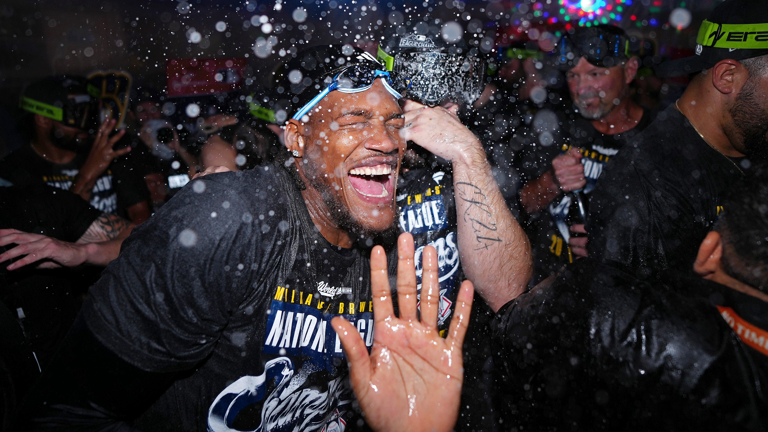 Abner Uribe celebrates in the clubhouse