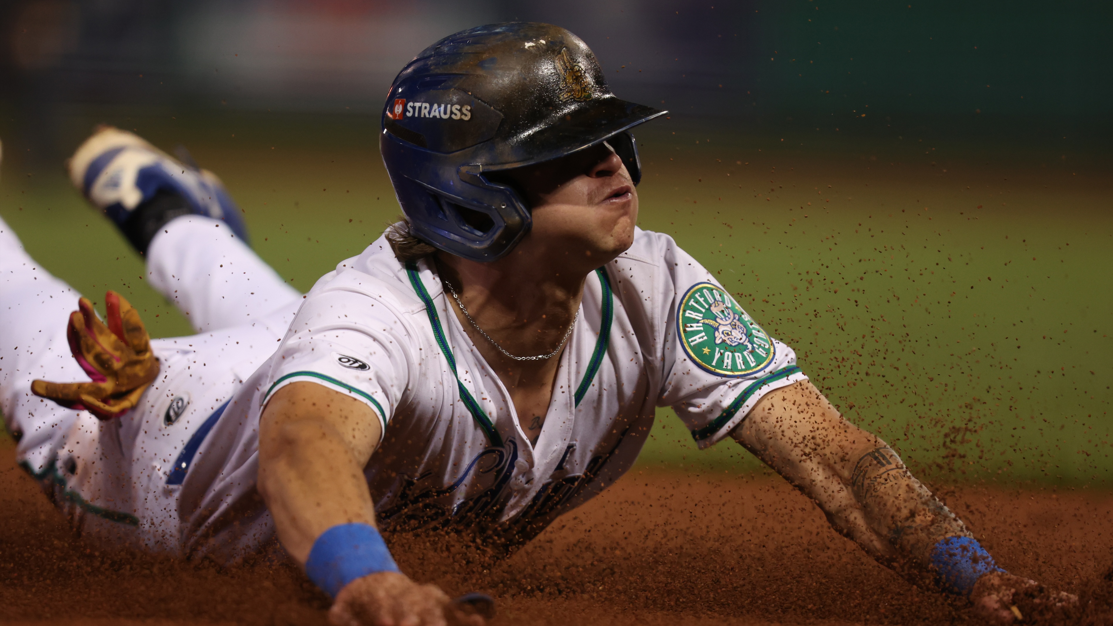 Cole Carrigg slides into a base