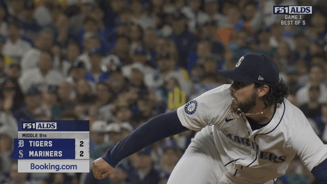 An animated gif of Andrés Muñoz catching a line drive and falling to the ground