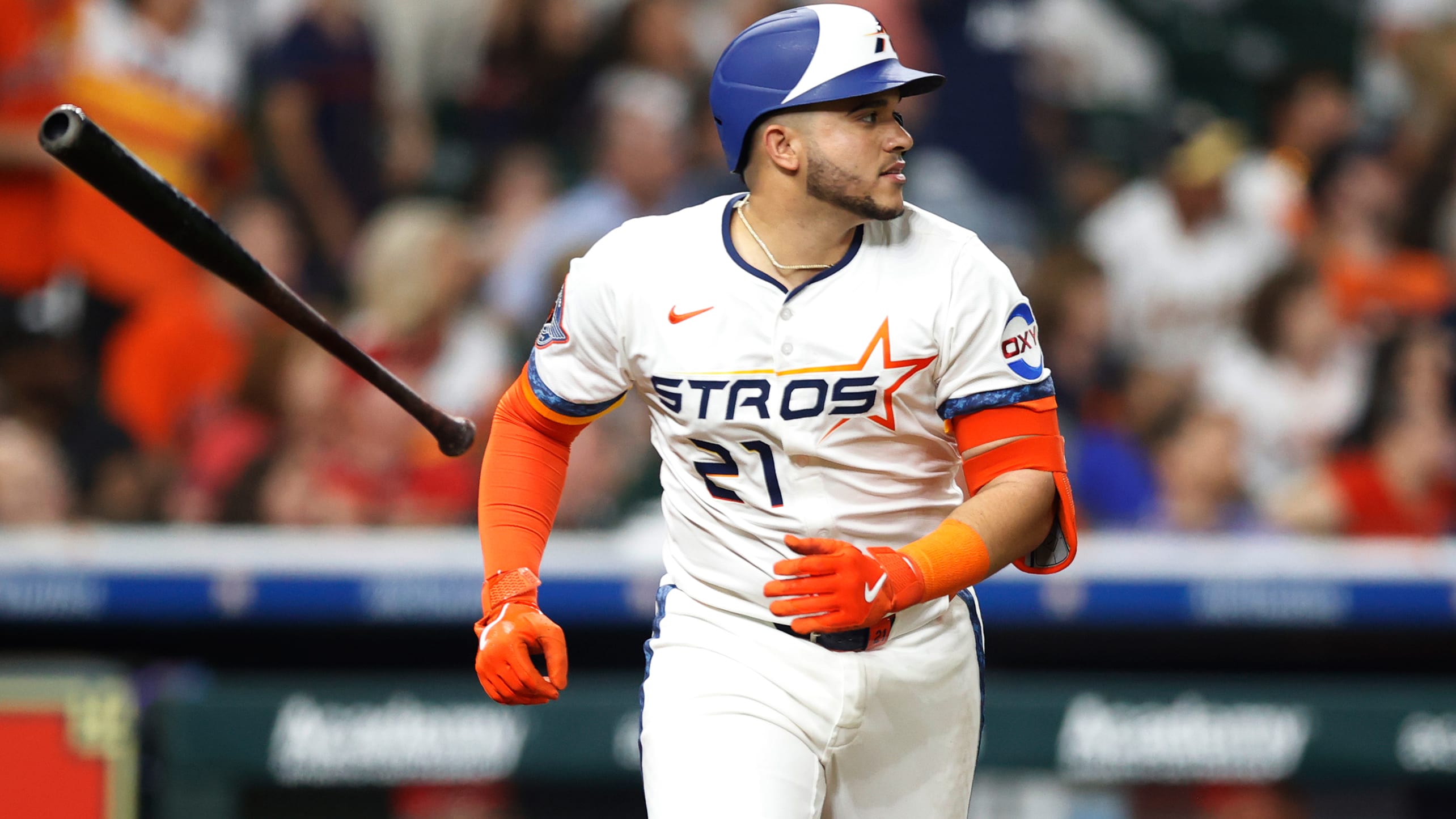 The Astros' Yainer Diaz tosses his bat aside as he watches his grand slam