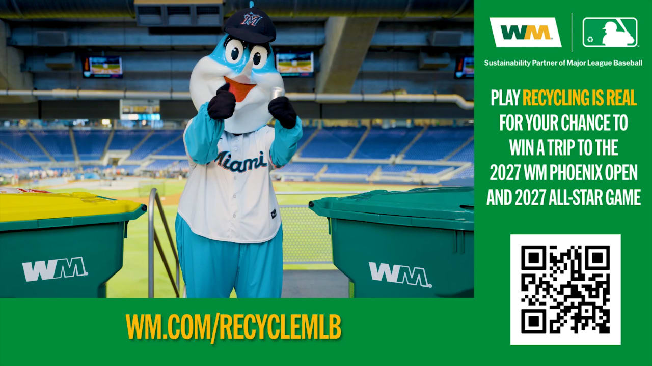 Marlins mascot Billy the Marlin between two WM trash bins