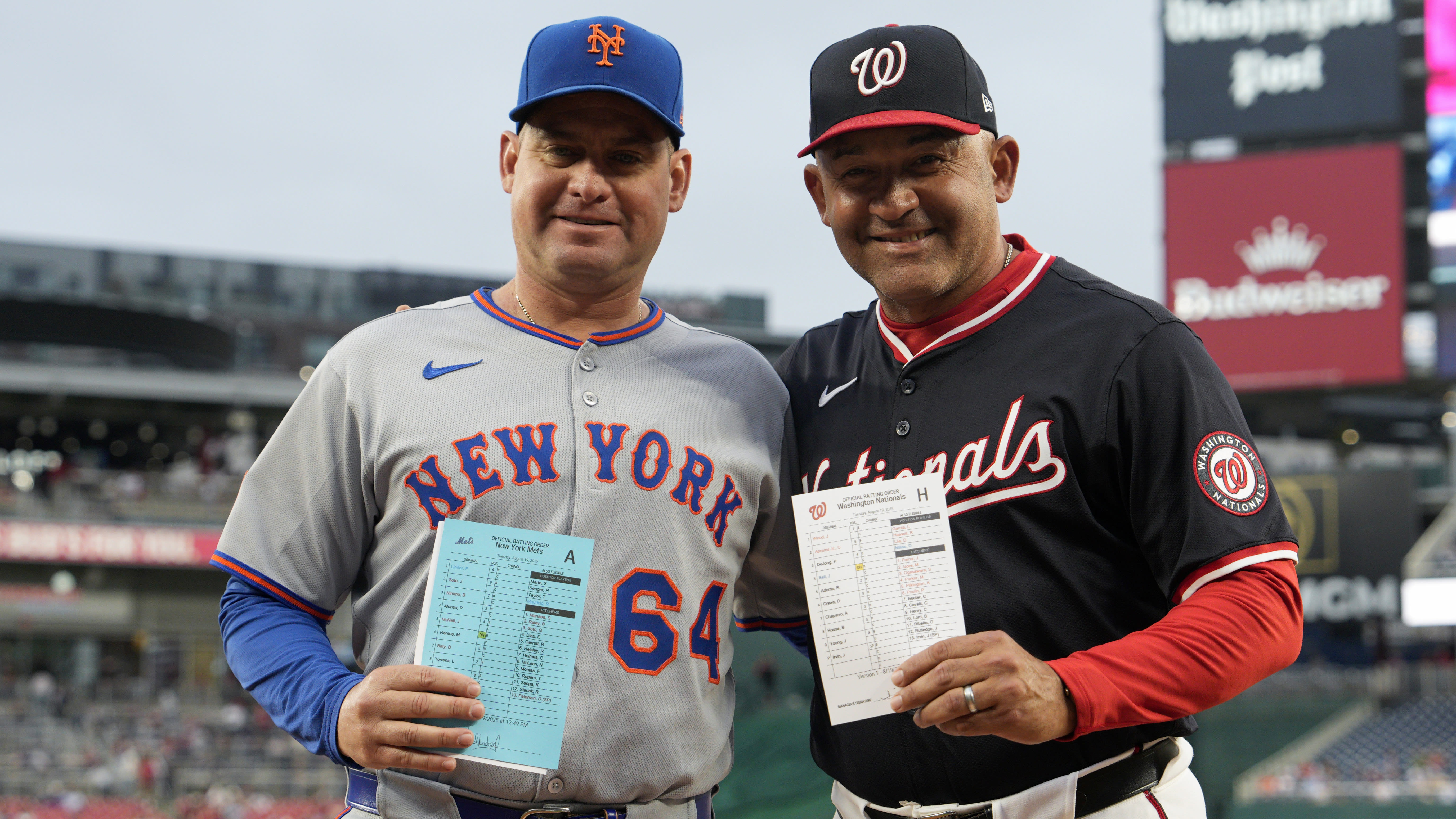 Mets manager Carlos Mendoza and Nationals interim manager Miguel Cairo