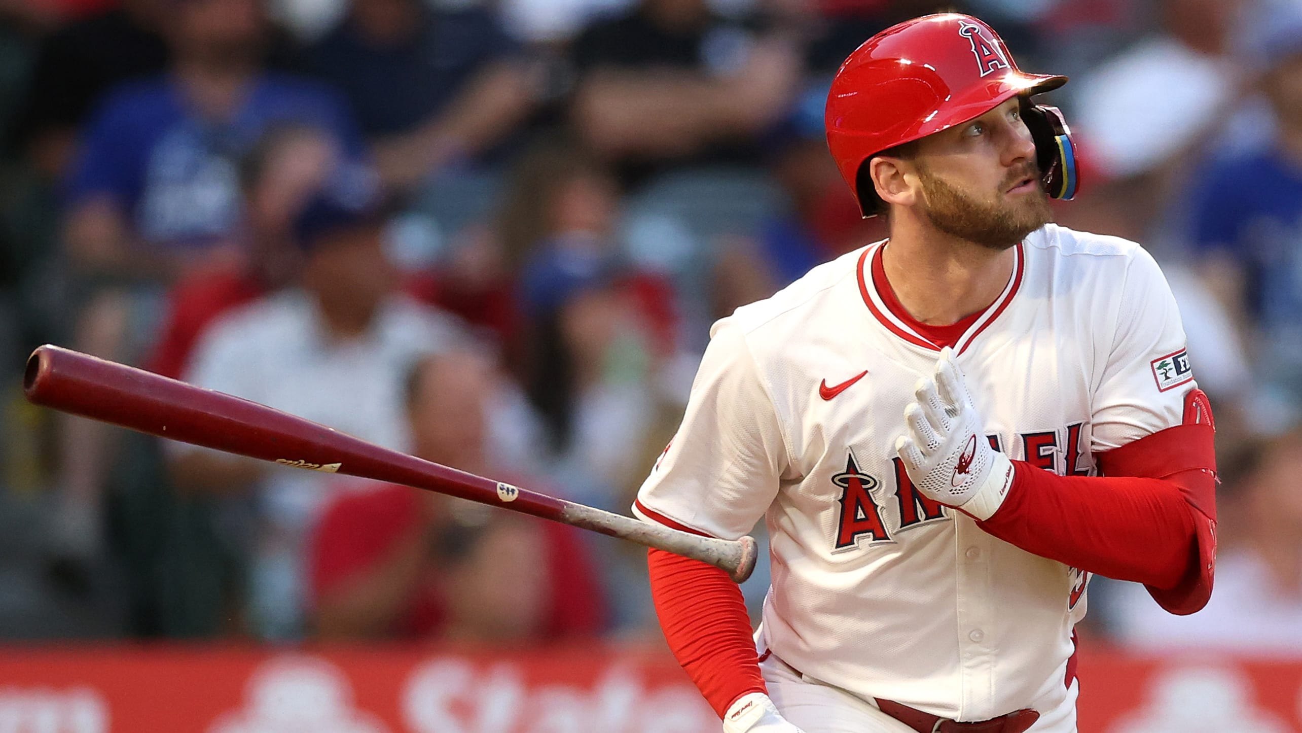 Taylor Ward tosses his bat aside