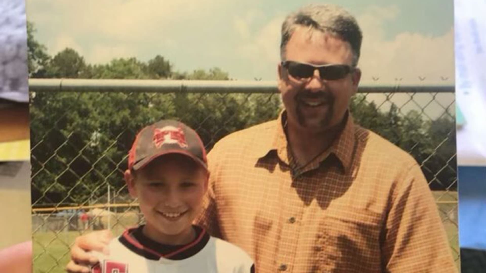 Cal Raleigh (left) with father Todd Raleigh