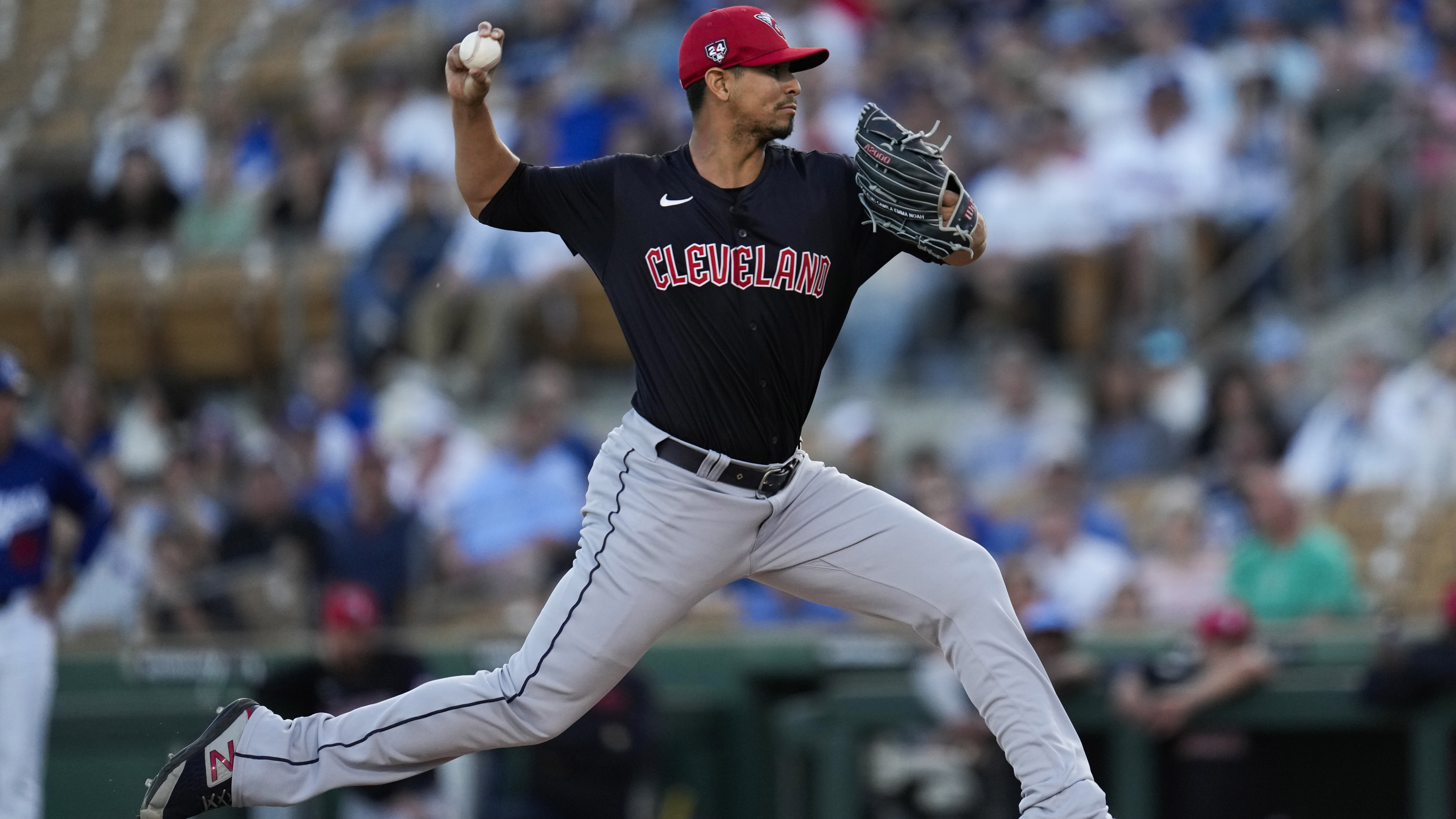 Carlos Carrasco delivers a pitch
