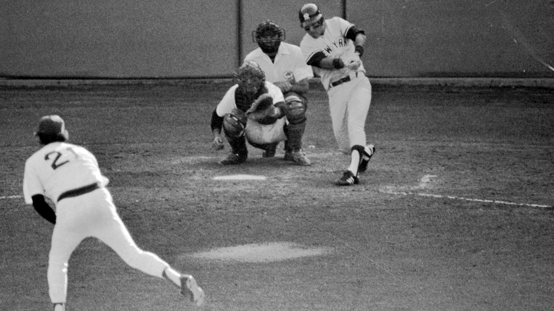 The Yankees' Bucky Dent hitting a home run against the Red Sox in 1978