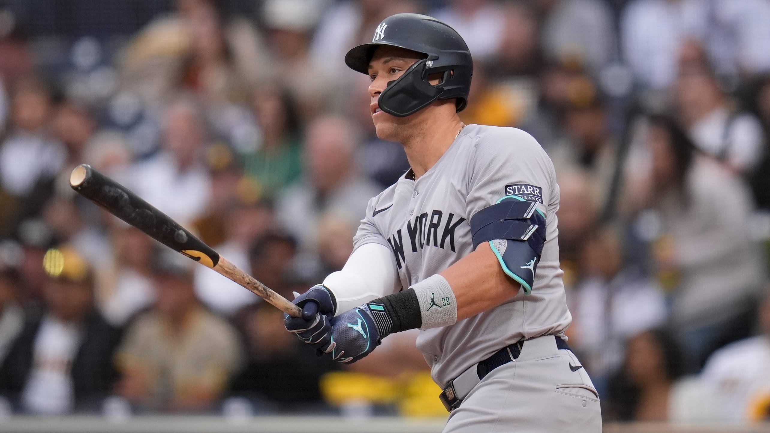 Aaron Judge follows through on a swing