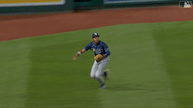 An animated gif of Chandler Simpson making a diving catch
