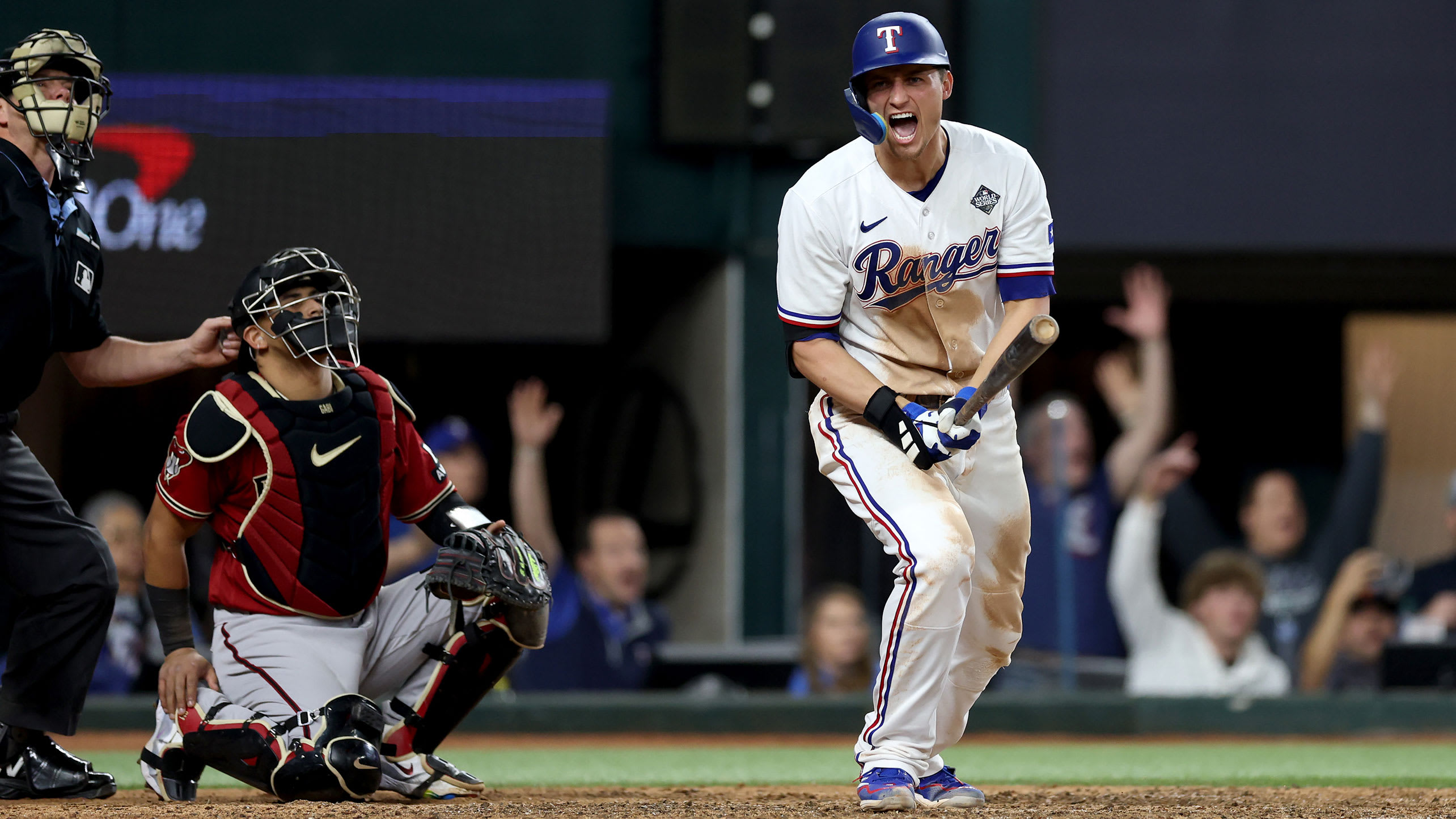 Corey Seager yells in celebration after hitting his game-tying homer