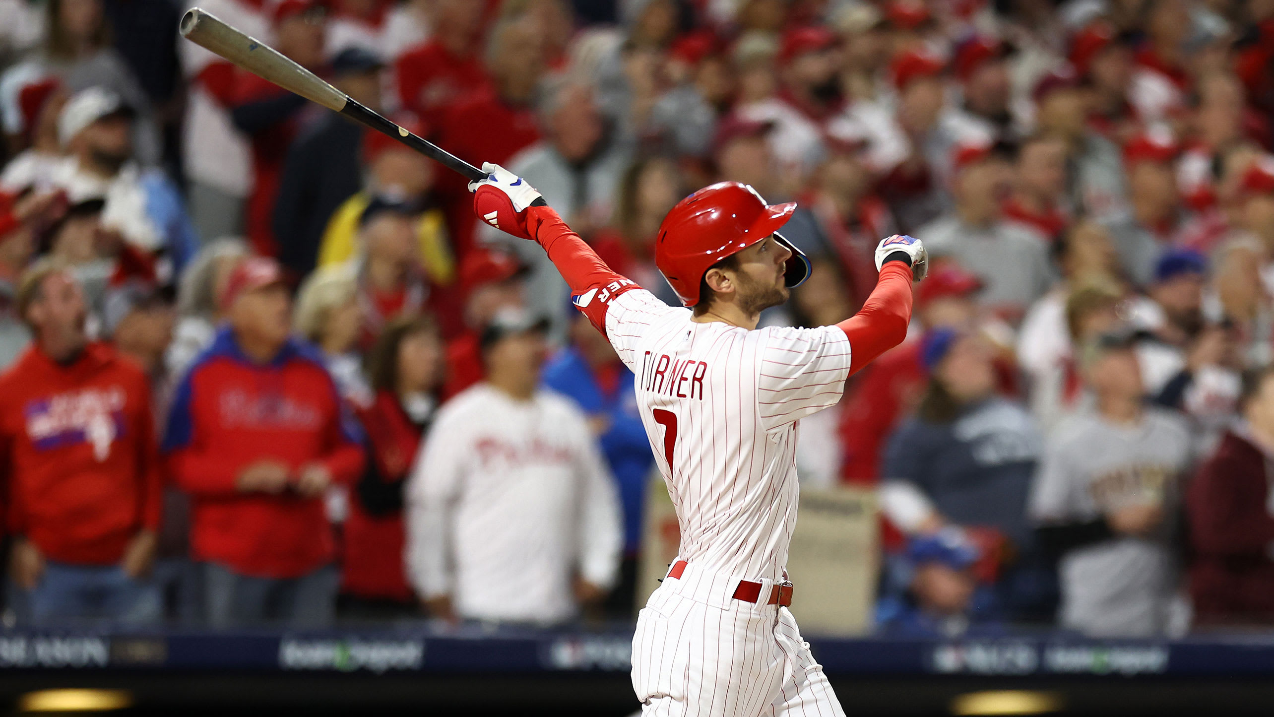 Trea Turner watches the flight of his first-inning home run