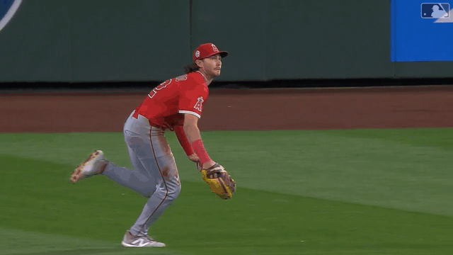 An animated gif of Bryce Teodosio making a diving backhanded catch in the outfield