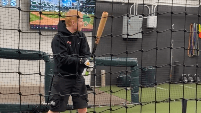Ed Sheeran in the batting cage