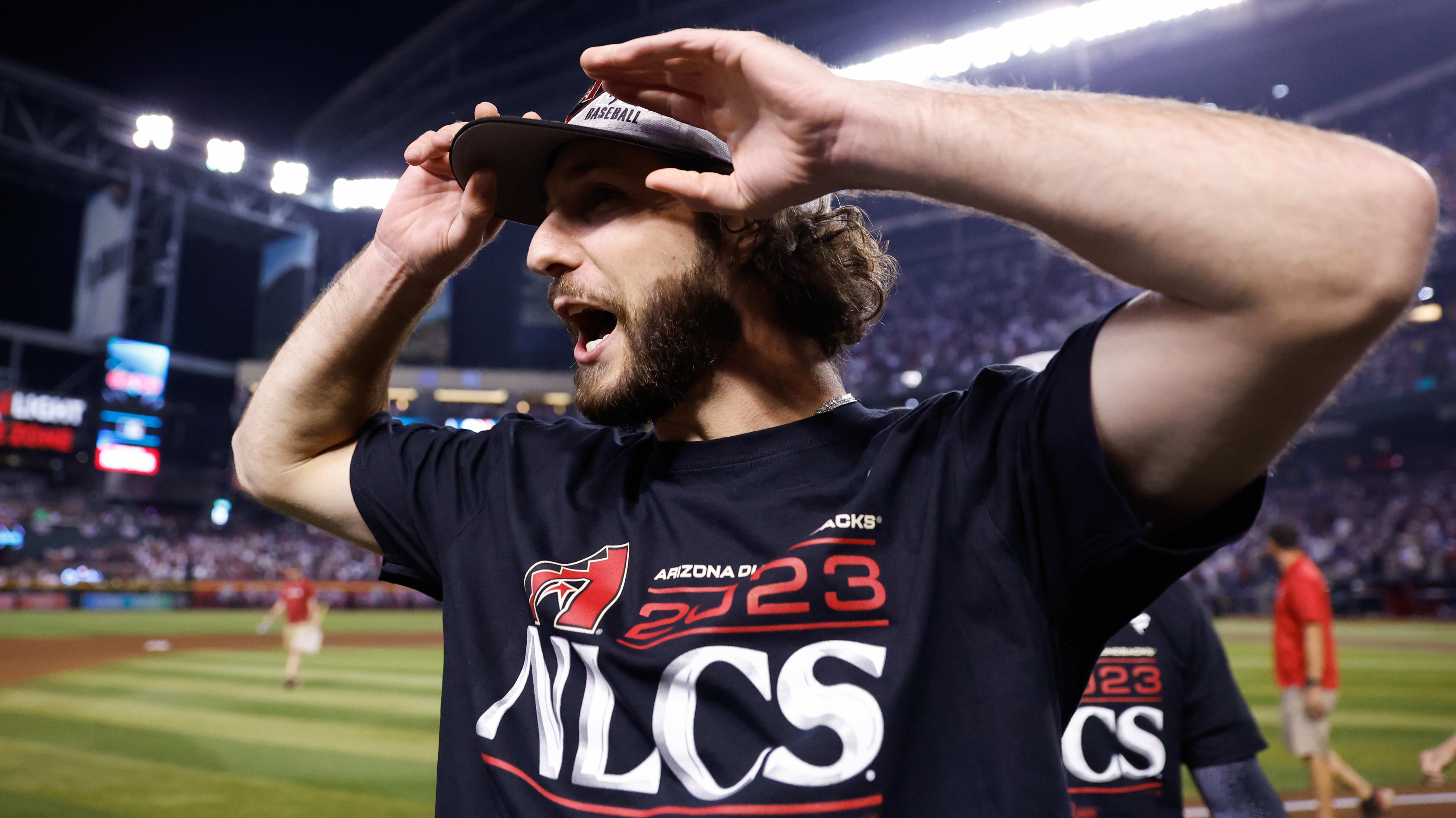 Zac Gallen celebrates after the D-backs advanced to the NLCS