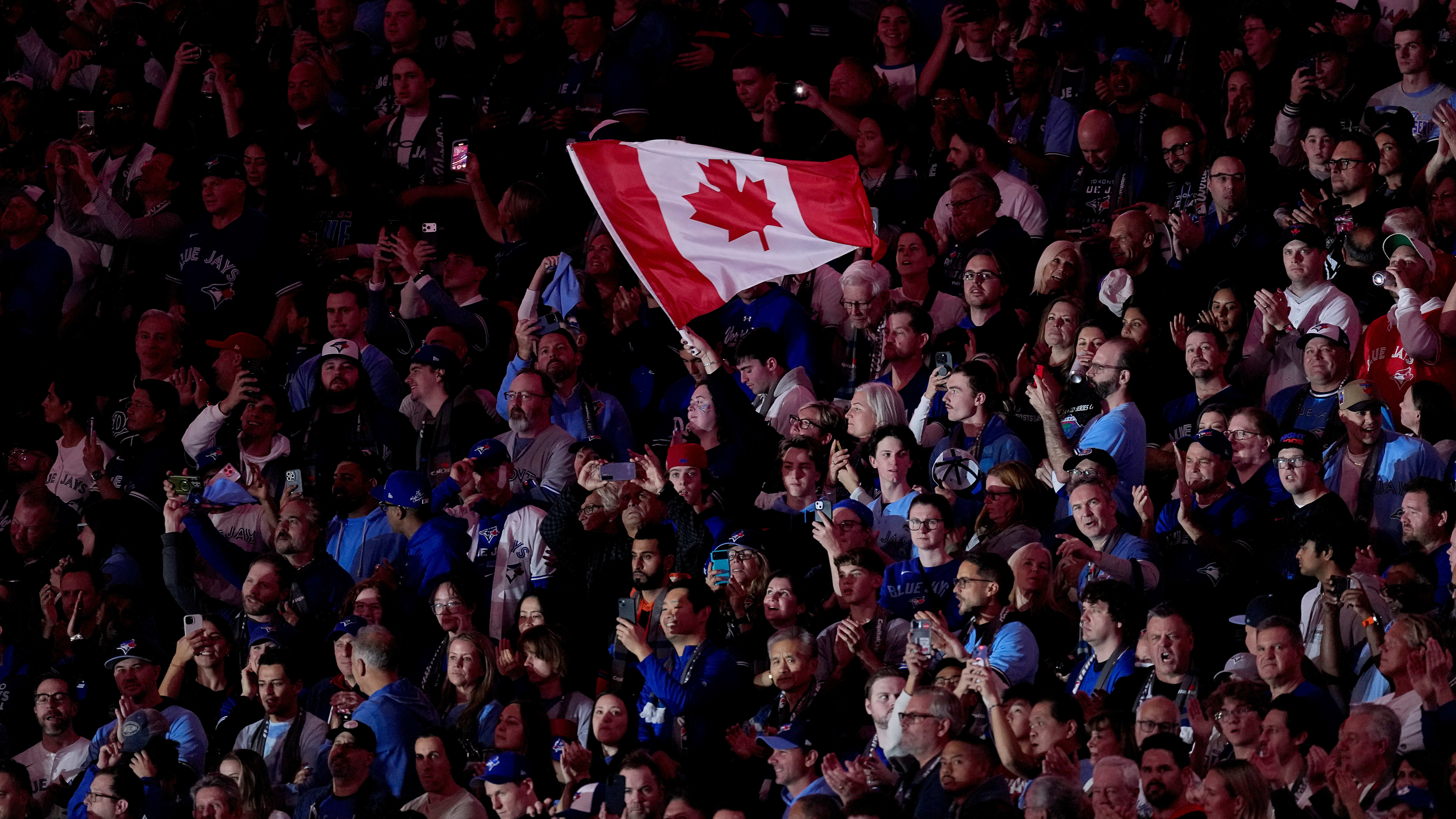 Toronto fans wave a Canadian flag