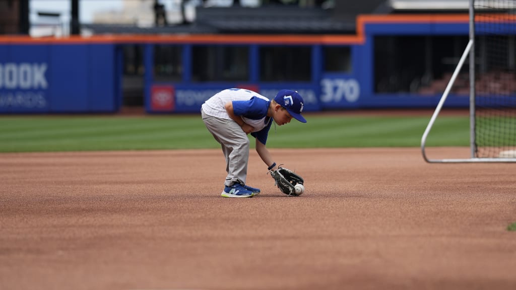Charley Kershaw takes grounders at Citi Field (Evan Yu for MLB)