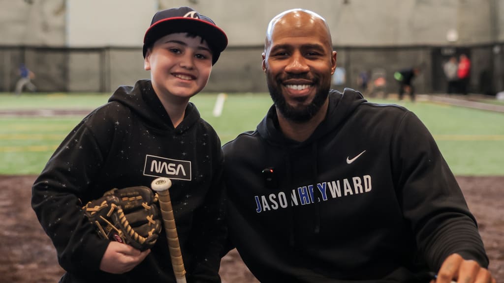 Heyward poses for a picture with one of the many participants in Saturday's baseball clinic in Chicago.