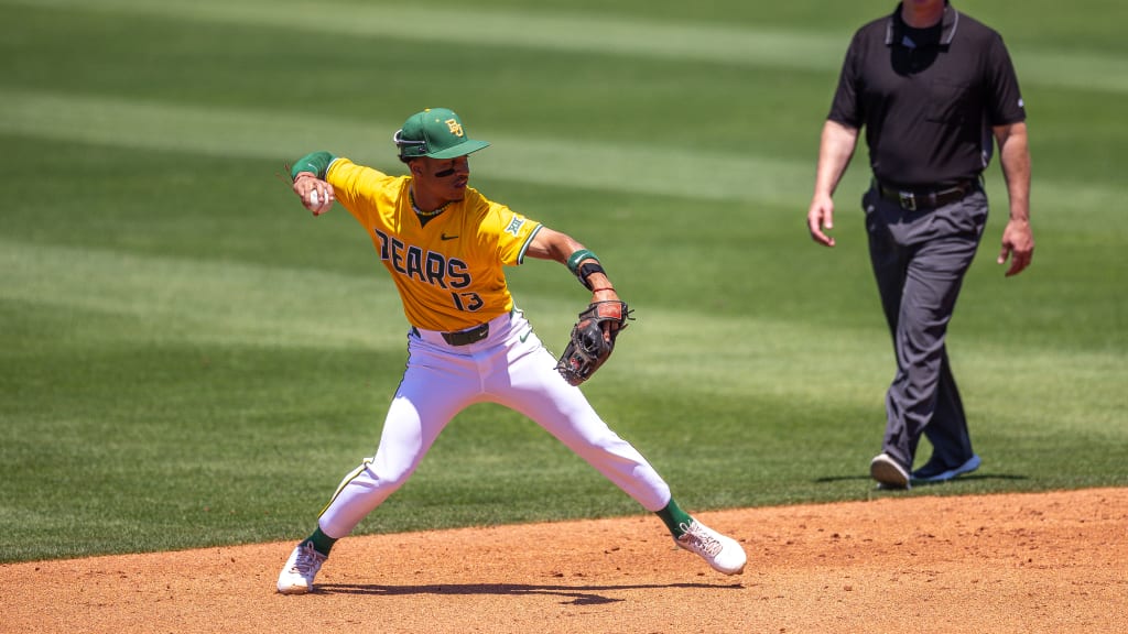 Tyriq Kemp makes the throw to first.