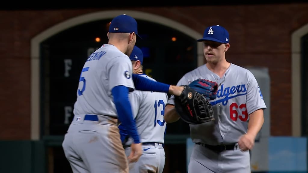 Urías hits, pitches Dodgers past Giants to even NLDS series