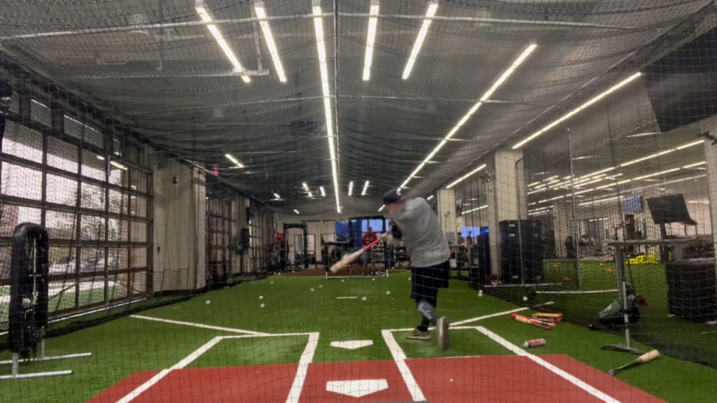 Alex Verdugo takes swings in the batting cage