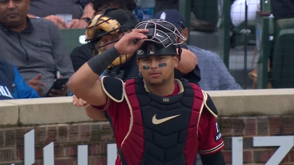 Arizona Diamondbacks' Zac Gallen jogs to the dugout after scoring