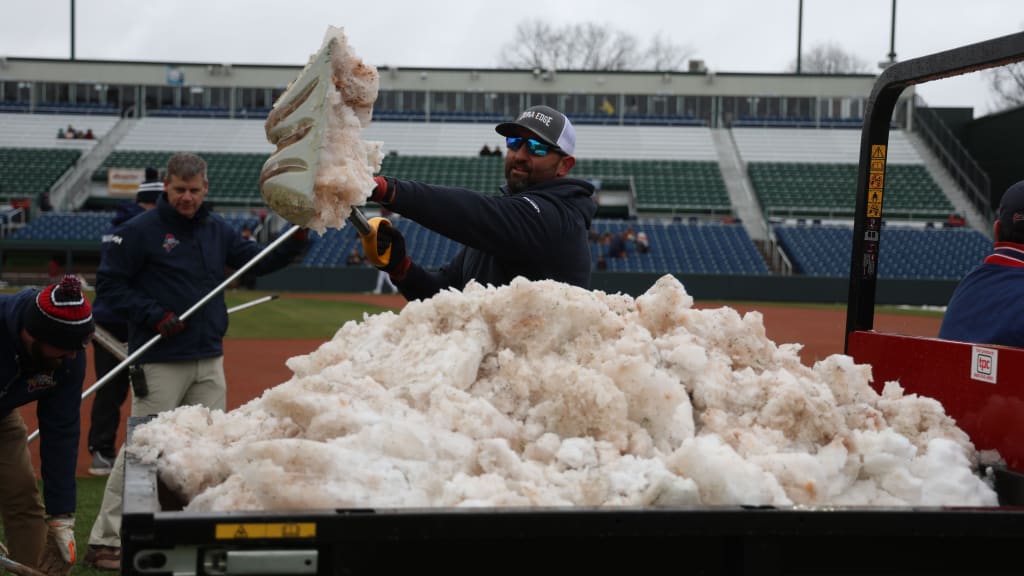 The Portland Sea Dogs' grounds crew had some shoveling to do before the home opener in Maine.