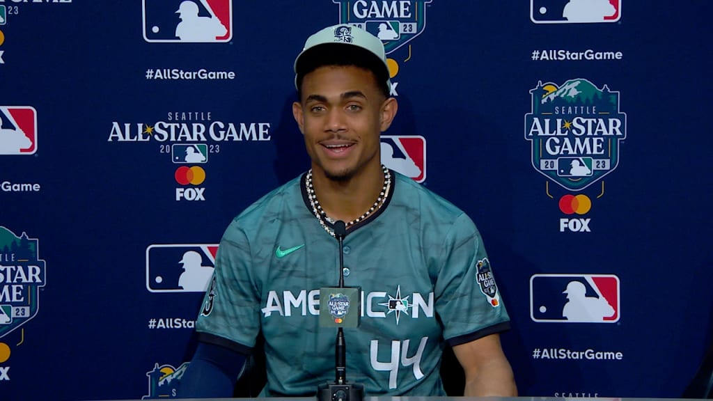 American League's Julio Rodriguez, of the Seattle Mariners, smiles